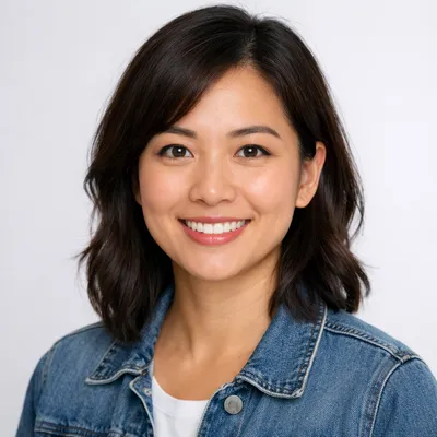 Photorealistic avatar portrait of a diverse adult with a warm, friendly expression, neat attire, and light background.