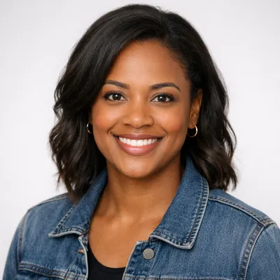 Photorealistic avatar of a diverse adult with warm expression on light background