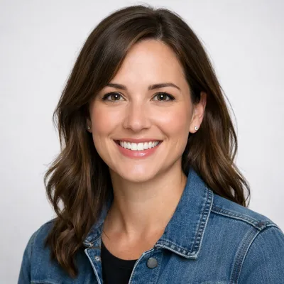 Photorealistic avatar of a diverse adult in professional headshot style, 1:1 aspect ratio with a friendly expression.