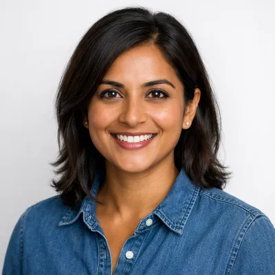 Photorealistic avatar of a diverse adult with a friendly expression, professional headshot style, soft white background.
